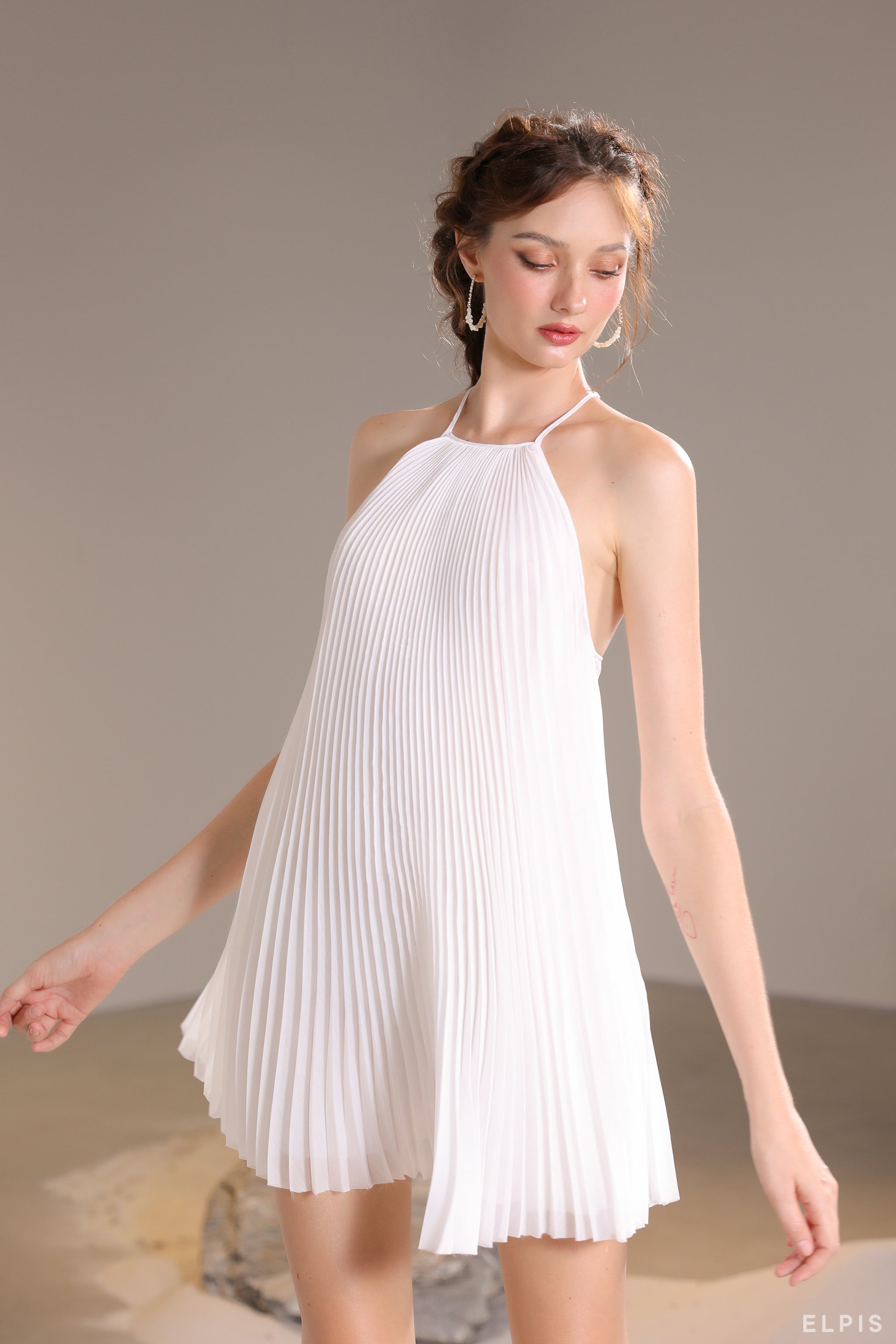 Pleat mini A-line dress featuring halter neckline | SS21D82
