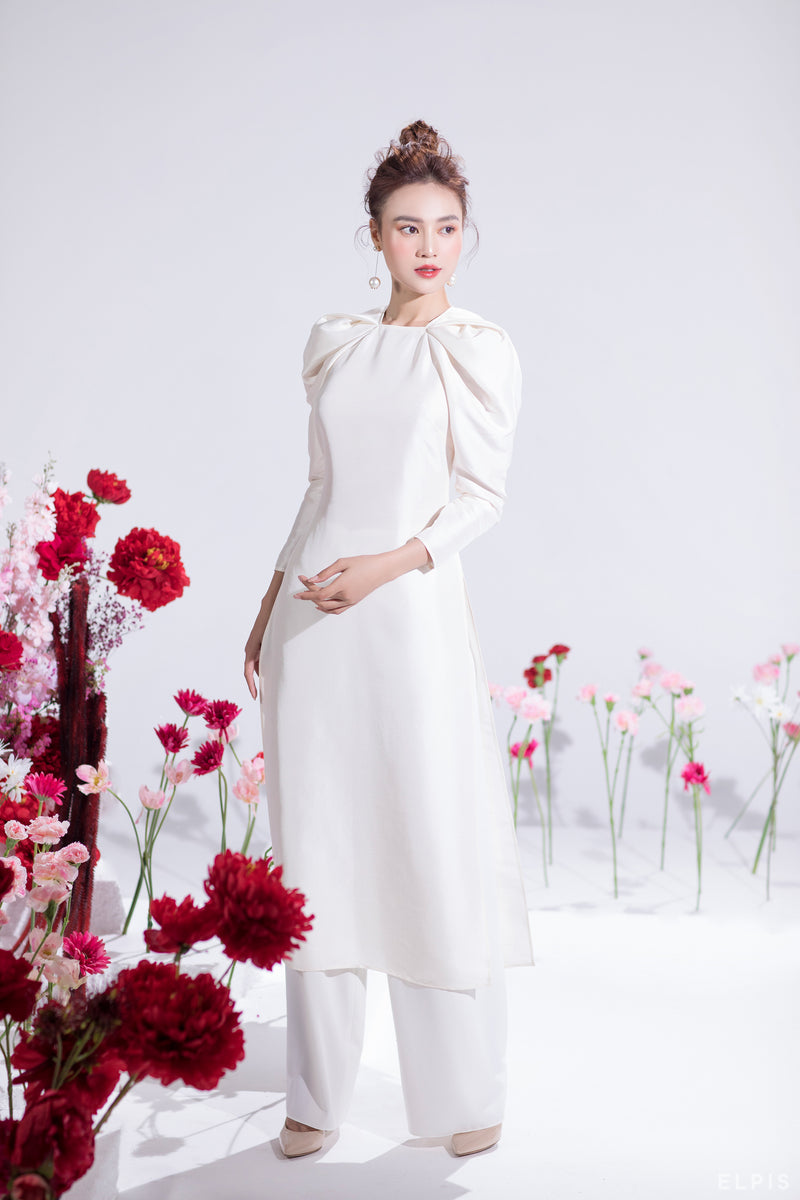 Pants is wearing with Ao Dai featuring wide leg, full length, zipper at back. | CHIEU XUAN