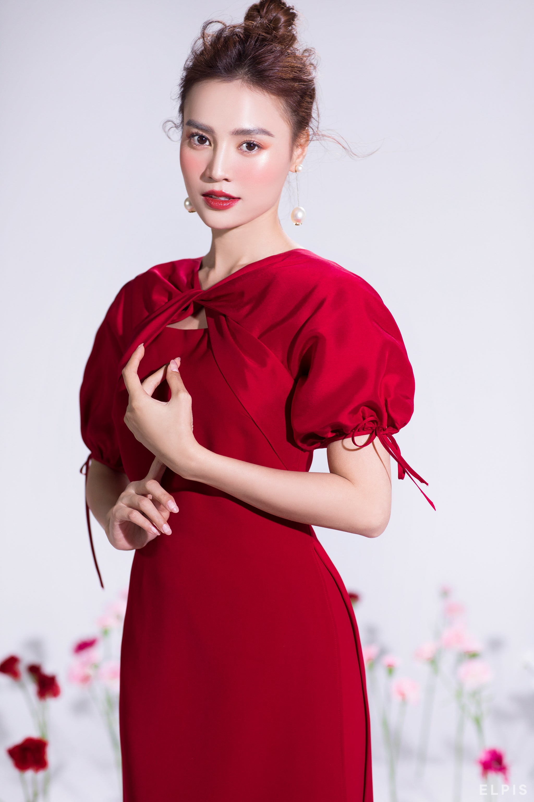 Ao dai featuring raglan balloon sleeves, round neckline, wrapping detailing | HOA HAO